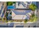 Overhead aerial view of house with long rectangular backyard, hot tub and pool at 1304 Fantastic Ct, North Las Vegas, NV 89081