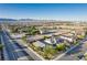 Wide aerial view of neighborhood with homes and landscape at 1304 Fantastic Ct, North Las Vegas, NV 89081