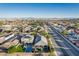 Aerial view of home with pool, covered patio and landscaped backyard at 1304 Fantastic Ct, North Las Vegas, NV 89081