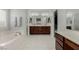 Luxurious bathroom featuring double vanities, a soaking tub, and recessed lighting at 1304 Fantastic Ct, North Las Vegas, NV 89081