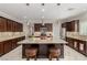 Gourmet kitchen with granite countertops, stainless appliances, and a large island for dining at 1304 Fantastic Ct, North Las Vegas, NV 89081
