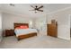 Well-lit primary bedroom featuring carpet floors, a ceiling fan, and ample space at 1304 Fantastic Ct, North Las Vegas, NV 89081