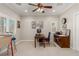 Well lit office space featuring built-in storage and bright window with plantation shutters at 1304 Fantastic Ct, North Las Vegas, NV 89081