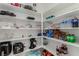 Walk-in pantry with organized shelving for ample storage at 1304 Fantastic Ct, North Las Vegas, NV 89081