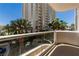 Relax on your private balcony overlooking mature landscaping and a towering building at 135 E Harmon Ave # 2702, Las Vegas, NV 89109