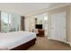 Bright bedroom with a comfortable bed, large windows, and a scenic view outside at 135 E Harmon Ave # 2702, Las Vegas, NV 89109