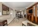 Spacious living room with a full view of the dining area, kitchen, and an elegant entertainment center at 135 E Harmon Ave # 2702, Las Vegas, NV 89109