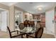 Inviting living and dining space featuring a view of the bathroom and kitchen and an open floor plan at 135 E Harmon Ave # 2702, Las Vegas, NV 89109