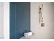 Bathroom boasts brass hardware, custom tile, and a glass shower at 1429 Iron Hills Ln, Las Vegas, NV 89134