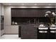 Modern kitchen featuring dark wood cabinetry, a marble island with seating, and luxury appliances at 1429 Iron Hills Ln, Las Vegas, NV 89134