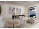 Bright office space featuring modern furniture, art, and a large window with courtyard views at 1429 Iron Hills Ln, Las Vegas, NV 89134