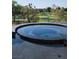 Beautiful pool and golf course views enhance this luxurious backyard setting at 1429 Iron Hills Ln, Las Vegas, NV 89134