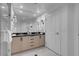 Modern bathroom featuring dual sinks with a glass enclosed shower at 145 E Harmon Ave # 3705, Las Vegas, NV 89109