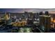 This stunning city view captures the vibrant energy of the city skyline at twilight at 145 E Harmon Ave # 3705, Las Vegas, NV 89109
