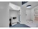 Walk-in closet with built-in shelving, a secure safe, and ample storage space at 145 E Harmon Ave # 3705, Las Vegas, NV 89109