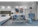 Inviting living room with comfortable seating, stylish modern decor, and large windows to allow for natural light at 145 E Harmon Ave # 3705, Las Vegas, NV 89109