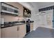 Convenient wet bar area featuring modern appliances and cabinetry, perfect for entertaining guests at 145 E Harmon Ave # 3705, Las Vegas, NV 89109