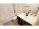 Bathroom featuring a white shower, vanity, toilet, and dark fixtures at 145 Forest Crossing Ct, Las Vegas, NV 89148