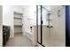 Bathroom with luxurious tiled shower and separate soaking tub with a walk-in closet at 145 Forest Crossing Ct, Las Vegas, NV 89148
