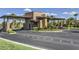 Elegant stone gate house with manicured landscaping at the community entrance at 145 Forest Crossing Ct, Las Vegas, NV 89148