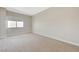 Bright bedroom featuring large window and neutral carpet at 150 Las Vegas Blvd # 1716, Las Vegas, NV 89101