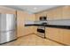 Efficient kitchen featuring stainless steel appliances, ample cabinetry, and granite countertops at 150 Las Vegas Blvd # 1716, Las Vegas, NV 89101