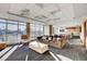 Spacious living room filled with sunlight offering city views from large windows and ample seating space at 150 Las Vegas Blvd # 1716, Las Vegas, NV 89101
