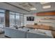 Community lounge with sectional sofas and city views at 150 Las Vegas Blvd # 1716, Las Vegas, NV 89101