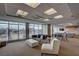 Resident lounge showcasing stylish furniture and expansive windows with city views at 150 Las Vegas Blvd # 1716, Las Vegas, NV 89101