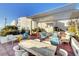 A furnished rooftop deck features comfortable seating, a dining table, and decor at 150 Las Vegas Blvd # 1716, Las Vegas, NV 89101