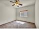 Bedroom with ceiling fan and window at 1604 Lazy Hill Ranch Way, North Las Vegas, NV 89081
