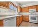 Bright kitchen with stainless steel sink, modern appliances, and ample cabinet space at 1604 Lazy Hill Ranch Way, North Las Vegas, NV 89081