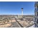 Elevated view capturing The Strat Hotel and Casino with surrounding landscape at 200 W Sahara Ave # 2210, Las Vegas, NV 89102