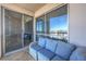 Cozy balcony features comfortable furniture and views overlooking the city at 200 W Sahara Ave # 2210, Las Vegas, NV 89102