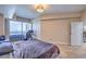 Bedroom features travertine flooring and expansive views through a large window at 200 W Sahara Ave # 2210, Las Vegas, NV 89102