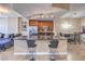 Contemporary kitchen featuring granite countertops, stainless steel appliances, and open layout to the dining area at 200 W Sahara Ave # 2210, Las Vegas, NV 89102