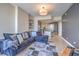 Comfortable living room features a plush sectional sofa and stylish decor with an open-concept design at 200 W Sahara Ave # 2210, Las Vegas, NV 89102