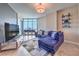 Modern living room with floor-to-ceiling windows and a spacious layout, perfect for relaxation and entertaining at 200 W Sahara Ave # 2210, Las Vegas, NV 89102