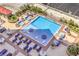 Relaxing pool area with modern lounge chairs, tables, and landscaping for resident enjoyment at 200 W Sahara Ave # 2210, Las Vegas, NV 89102