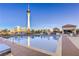 Stunning pool area with views of the Stratosphere and surrounding city skyline and relaxing lounge area at 200 W Sahara Ave # 2210, Las Vegas, NV 89102