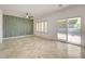 Bright, expansive living room with modern wall accents, neutral tones, and natural light at 2149 Kelsey Creek Ct, Henderson, NV 89044