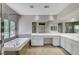 Elegant bathroom features a soaking tub, shower, and dual sink vanity at 229 N Buteo Woods Ln, Las Vegas, NV 89144