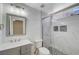 Beautiful bathroom featuring tiled shower, modern fixtures, and a double vanity for a luxurious feel at 229 N Buteo Woods Ln, Las Vegas, NV 89144