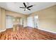 Bedroom boasts hardwood floors, ceiling fan, large closet, and ensuite bathroom at 229 N Buteo Woods Ln, Las Vegas, NV 89144