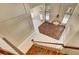 Open concept foyer with staircase and tile/wood flooring, offering views of the living room at 229 N Buteo Woods Ln, Las Vegas, NV 89144