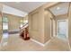 Elegant foyer with marble floors, a staircase, and high ceilings offers a welcoming entrance to the home at 229 N Buteo Woods Ln, Las Vegas, NV 89144