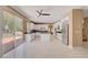 Bright kitchen with stainless steel appliances, a center island, and backyard access at 229 N Buteo Woods Ln, Las Vegas, NV 89144