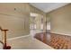 Spacious living room with soaring ceilings, decorative chandelier and elegant staircase at 229 N Buteo Woods Ln, Las Vegas, NV 89144