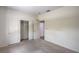Standard bedroom with a closet featuring bi-fold doors and access to additional rooms at 2413 Rockford St, Las Vegas, NV 89134