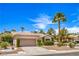 Charming single-story home with a well-maintained yard, a two-car garage, and desert-friendly landscaping at 2413 Rockford St, Las Vegas, NV 89134